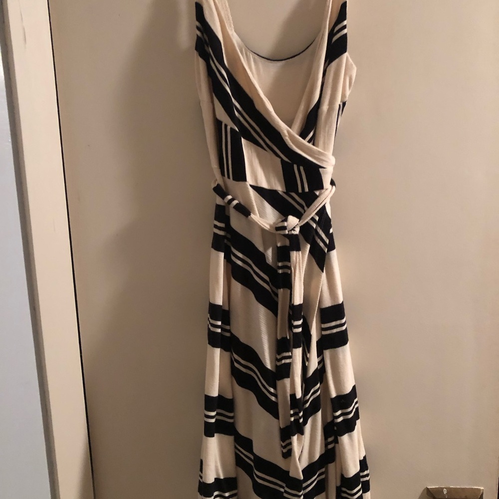 Women’s cream and black wrap dress
